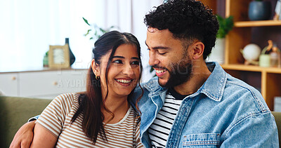 Buy stock photo Home, smile and couple on couch, hug and bonding together with happiness, calm and romance Embrace, apartment and man on sofa with woman, love and support with relationship and marriage in lounge