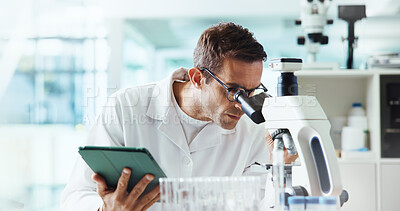 Buy stock photo Man, microscope and tablet for research in lab for medical study with container, review and vaccine development. Person, digital touchscreen and app for chemical analysis with pharmaceutical drugs