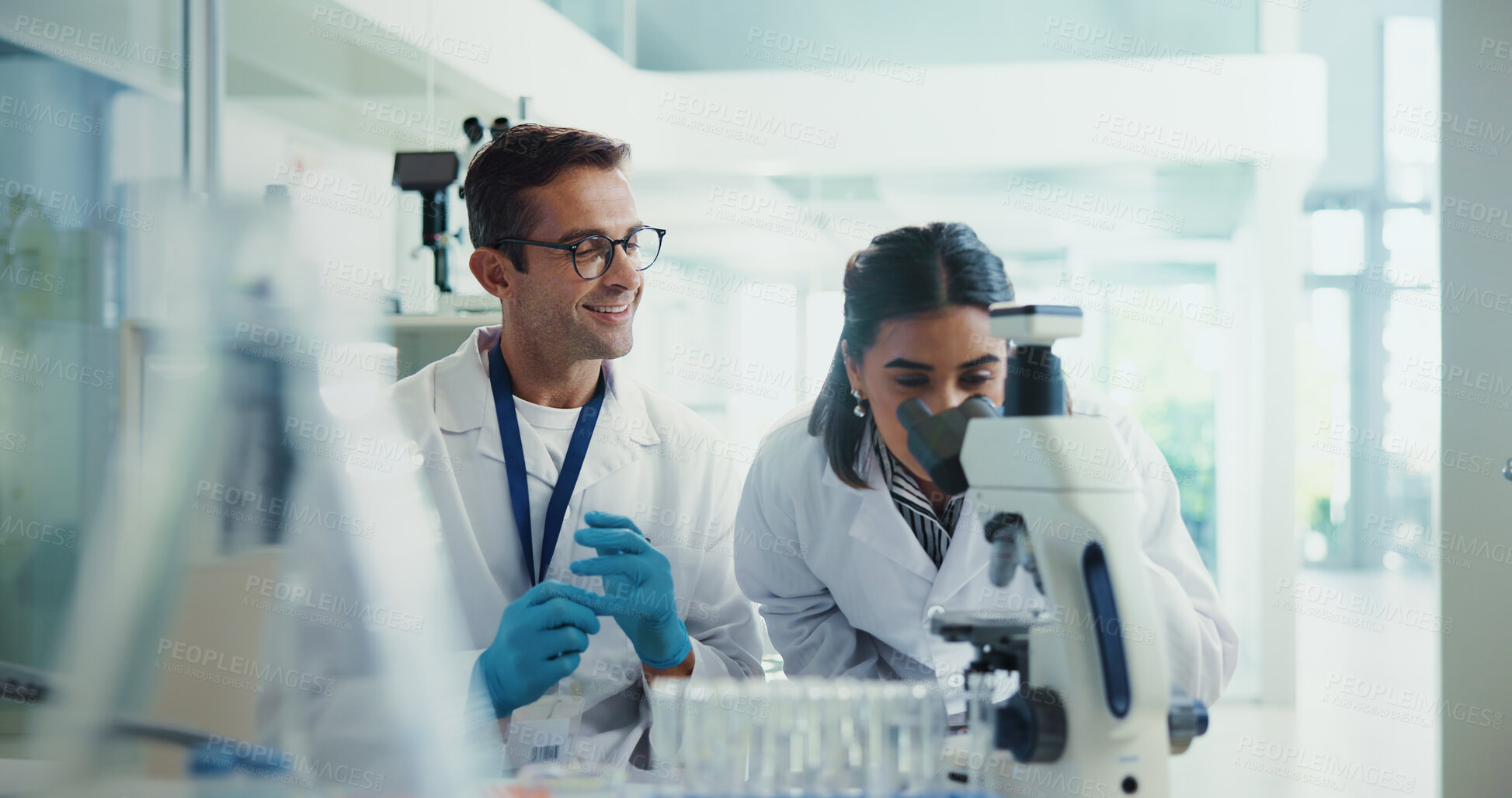 Buy stock photo Scientist, assistant and man for chemistry testing, microscope and medical research. Pathology, laboratory and woman with study report for pharmaceutical or biotech experiment for breakthrough