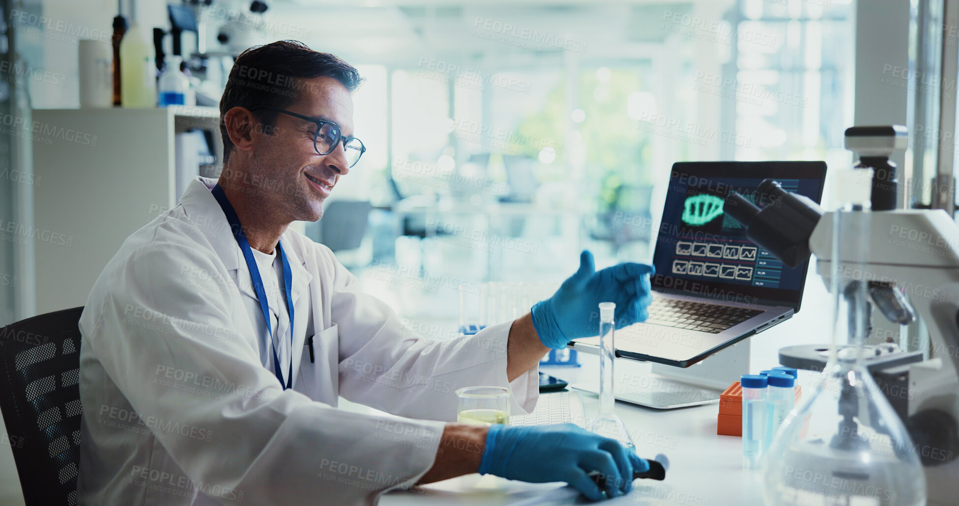 Buy stock photo Scientist, man and test tube in lab with dna, medical research ie analysis for gene editing trial. Person, smile and container for liquid, study and laptop for charts, progress or results with sample