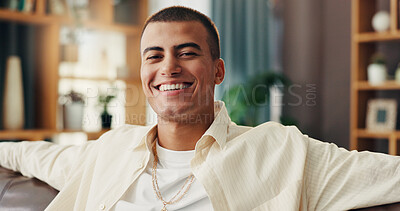 Buy stock photo Home, sofa and happy man in portrait for relax, comfortable and self care for mental health in living room. House, male person and smile on couch for chilling, resting and laugh with peace in lounge