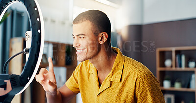 Buy stock photo Man, influencer and social network with ring light in home for live stream, happy and post on web. Person, smile and point with review for chat, audience and mobile app for content creation in house