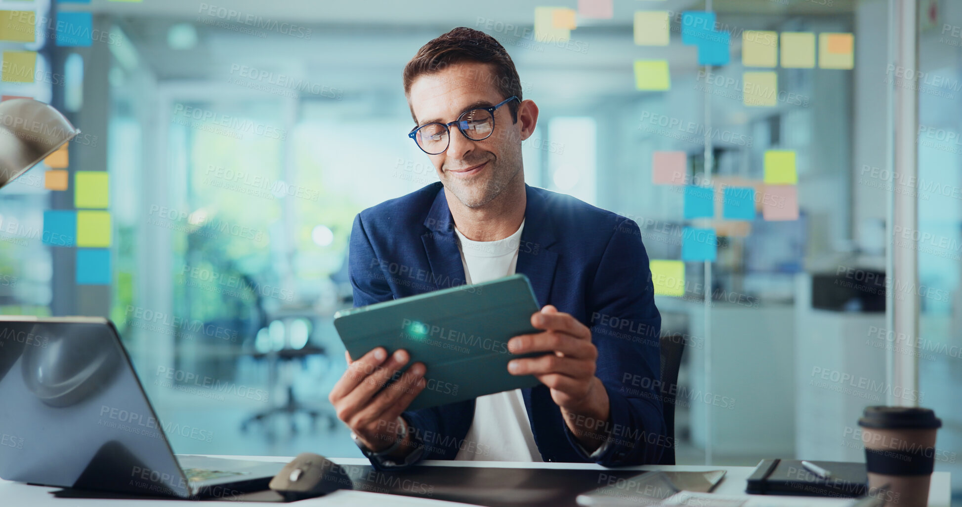 Buy stock photo Business, tablet and man in office, productivity and connection with social media. Person, copywriting and employee in workplace, tech and digital app with website info, email for approval and smile