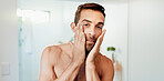 Man, portrait or lotion with mirror for skincare, glow or facial treatment at home. POV, male person or reflection with moisturizer, face cream or SPF for hygiene or anti aging cosmetics in bathroom
