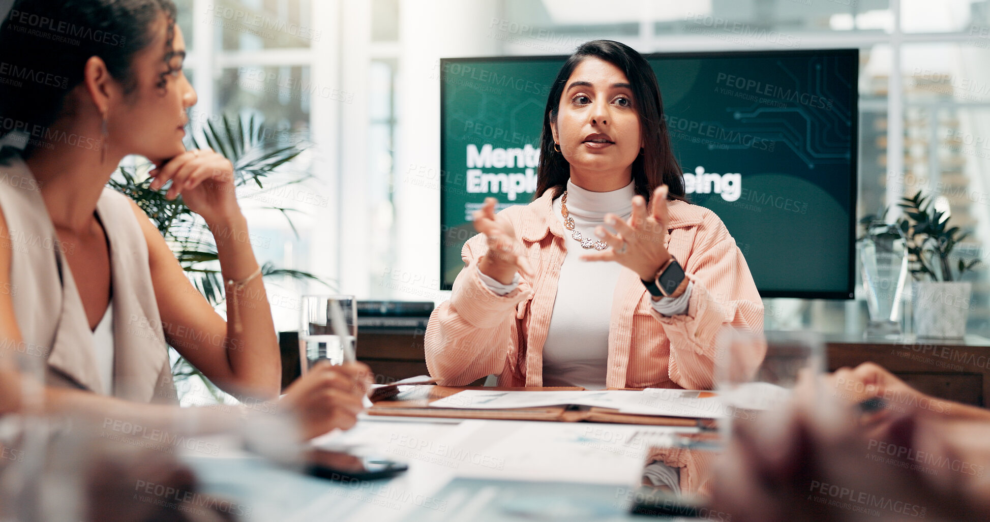 Buy stock photo Collaboration, human resources and meeting with business woman in boardroom of office for workshop. Mental wellbeing, presentation and screen with employee team in workplace for staff wellness