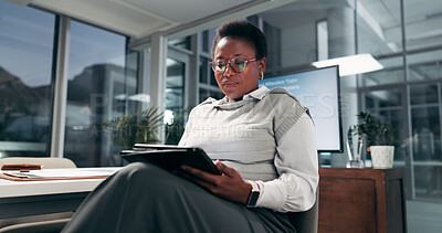 Buy stock photo Creative black woman, business and tablet in office for campaign, promotion or ads design. Technology, research or serious worker in startup for online review on overtime as brand specialist at night