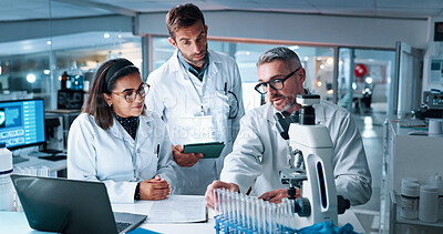 Buy stock photo Collaboration, medical and science with people in laboratory together for breakthrough or development. Laptop, microscope or tablet and DNA research team in clinical trial for learning with mentor