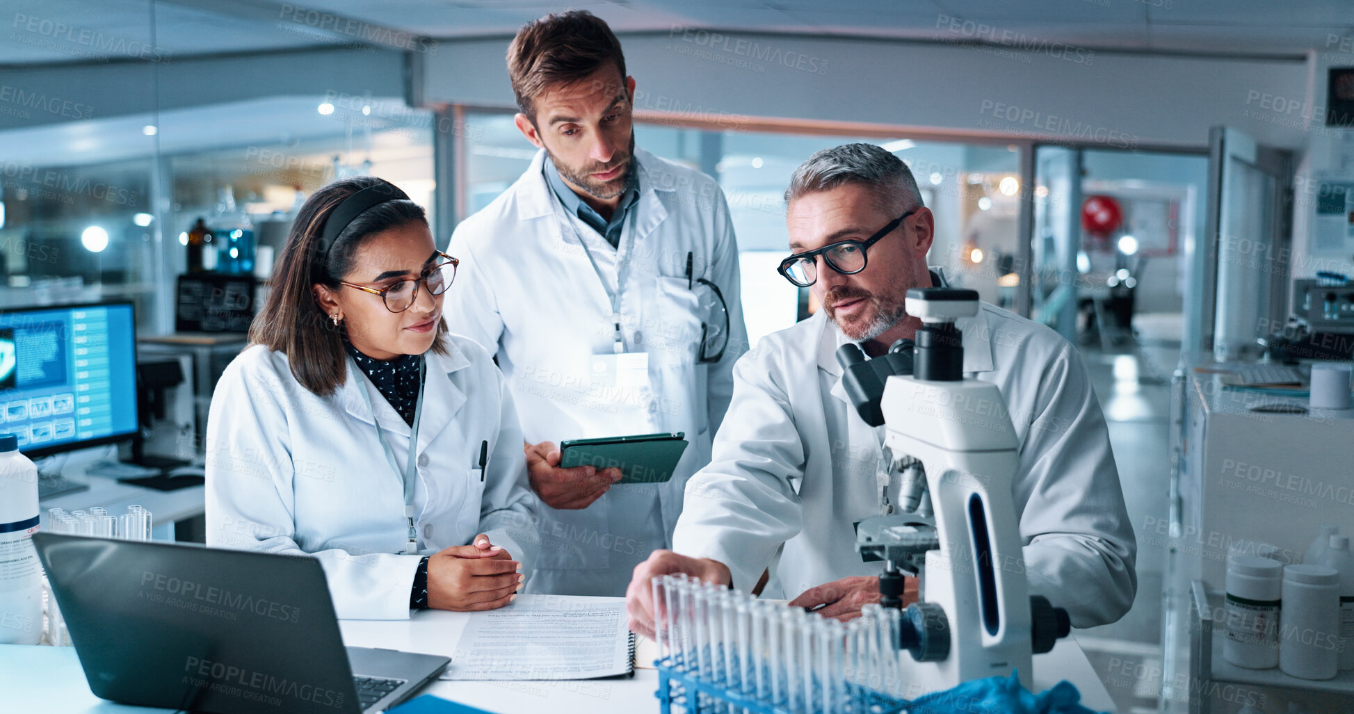 Buy stock photo Collaboration, medical and science with people in laboratory together for breakthrough or development. Laptop, microscope or tablet and DNA research team in clinical trial for learning with mentor