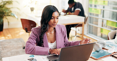 Buy stock photo Serious, student and woman with laptop, university and exam in classroom with information, reading and education. Learning, scholarship and people in college with tech, typing or online for knowledge