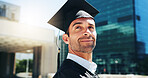 City, graduation and thinking with man student outdoor for celebration or education event. Future, scholarship and vision with happy college or university graduate in urban town for milestone