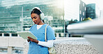 Nurse, city and woman on tablet with headphones for education, audiobook or wellness podcast. Technology, outdoor and healthcare with medical student listening to music or study at college campus
