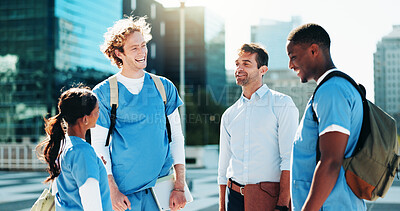 Buy stock photo Smile, professor and group students in city for medical study, nursing program and healthcare opportunity. People, teacher and funny joke of morning commute, learning internship and university course
