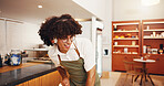 Music, man and barista dance in cafe with energy, radio and streaming hip hop playlist in startup on break. Headphones, happy waiter and listening to sound, audio and singing song in coffee shop