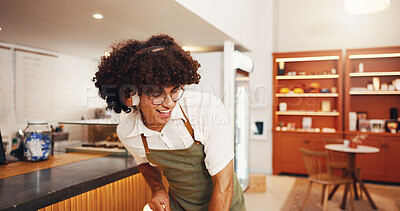Buy stock photo Music, man and barista dance in cafe with energy, radio and streaming hip hop playlist in startup on break. Headphones, happy waiter and listening to sound, audio and singing song in coffee shop