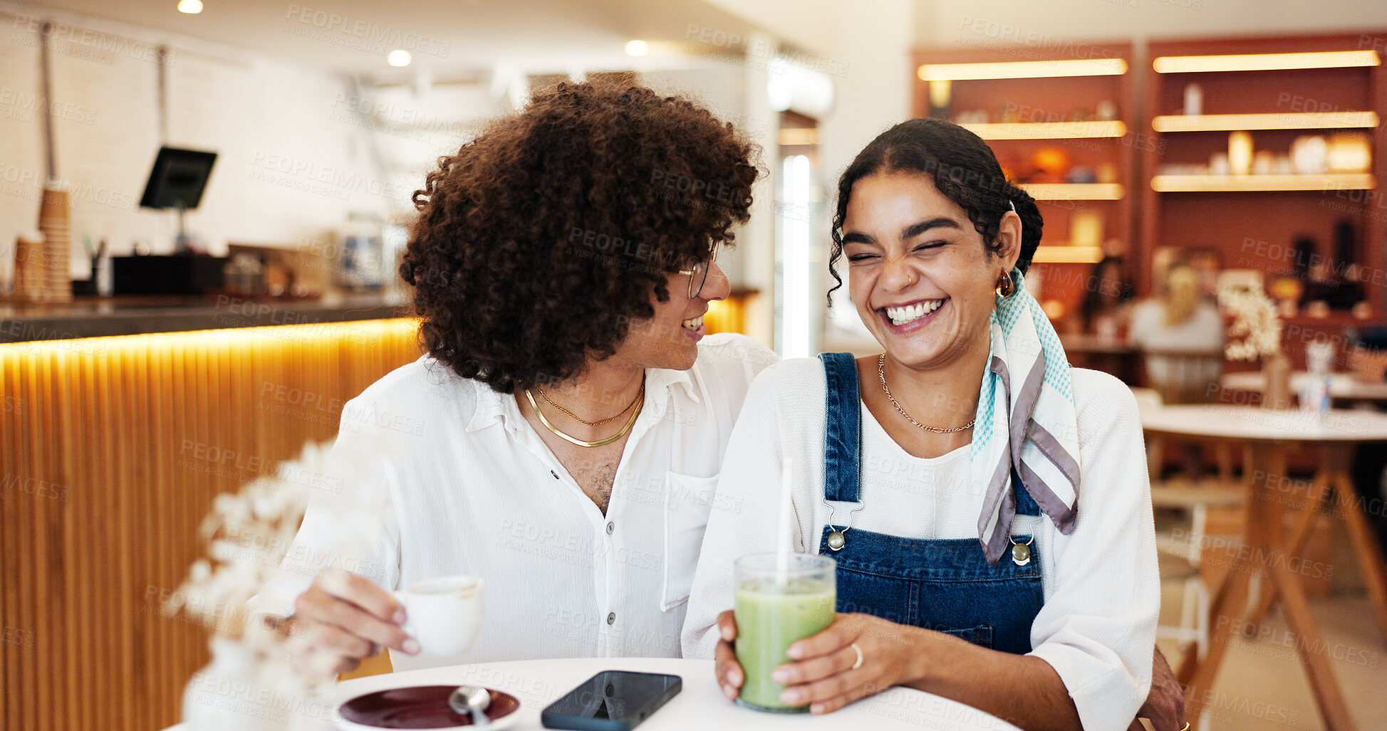 Buy stock photo Happy, laughing and couple in coffee shop on date for bonding, relationship and relax. Restaurant, cafe and man with woman with drink, beverage and latte for conversation, talking and chatting