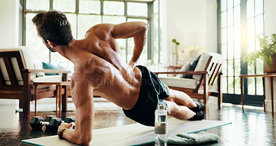 Buy stock photo Plank, stretching and man in home, exercise and balance for core muscles in living room and back. Morning, training and person with routine in lounge, posture and wellness with workout in house