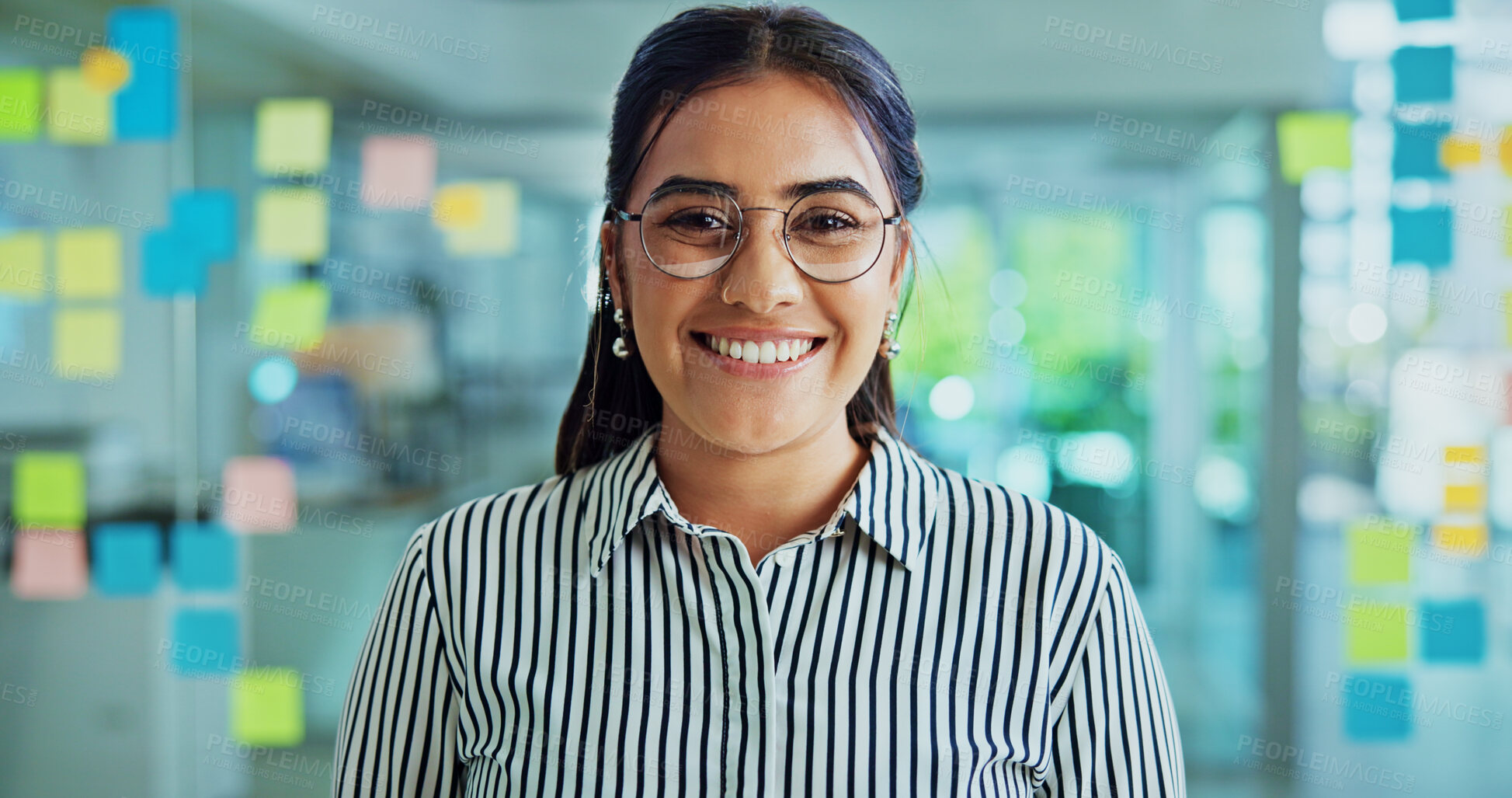 Buy stock photo Business woman, happy and portrait in office by wall, notes and pride for solution at startup. Person, smile and excited by moodboard, window and glasses with job at creative agency in Colombia
