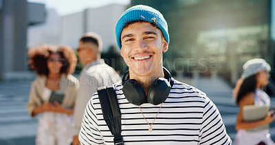 Buy stock photo Headphones, student and portrait of happy man in city for travel to university, college and school campus. Smile, relax and person with backpack in urban town for education, learning and knowledge