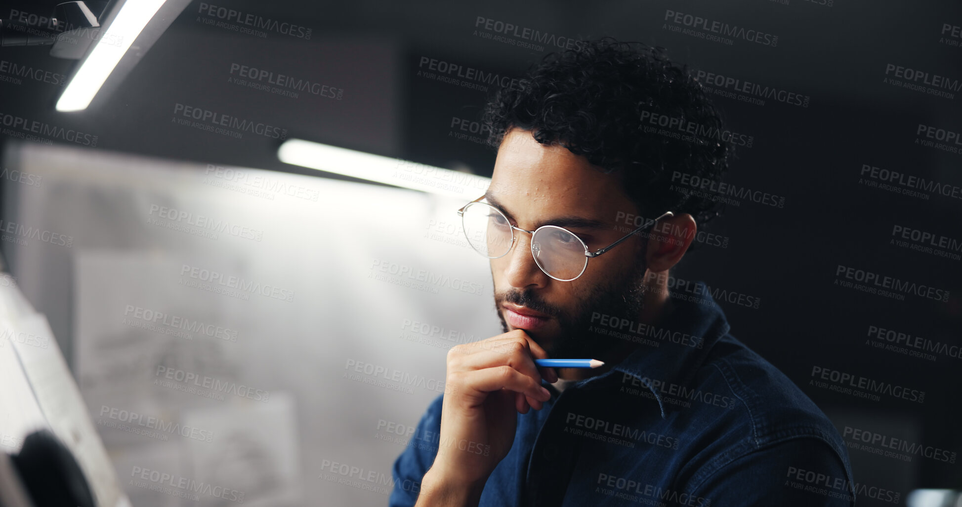 Buy stock photo Creative, artist and thinking at drawing board for draft sketch ideas, illustration deadline or picture inspiration. Night, man or illustrator with brainstorming for visual design or overtime project