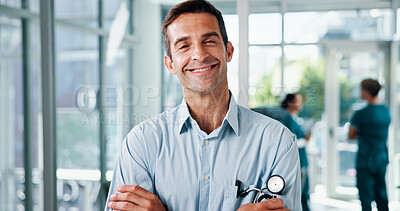 Buy stock photo Doctor, man and portrait with consultant at hospital for healthcare service, about us and career confidence. Medicine professional, physician and happy for health treatment and medical practitioner