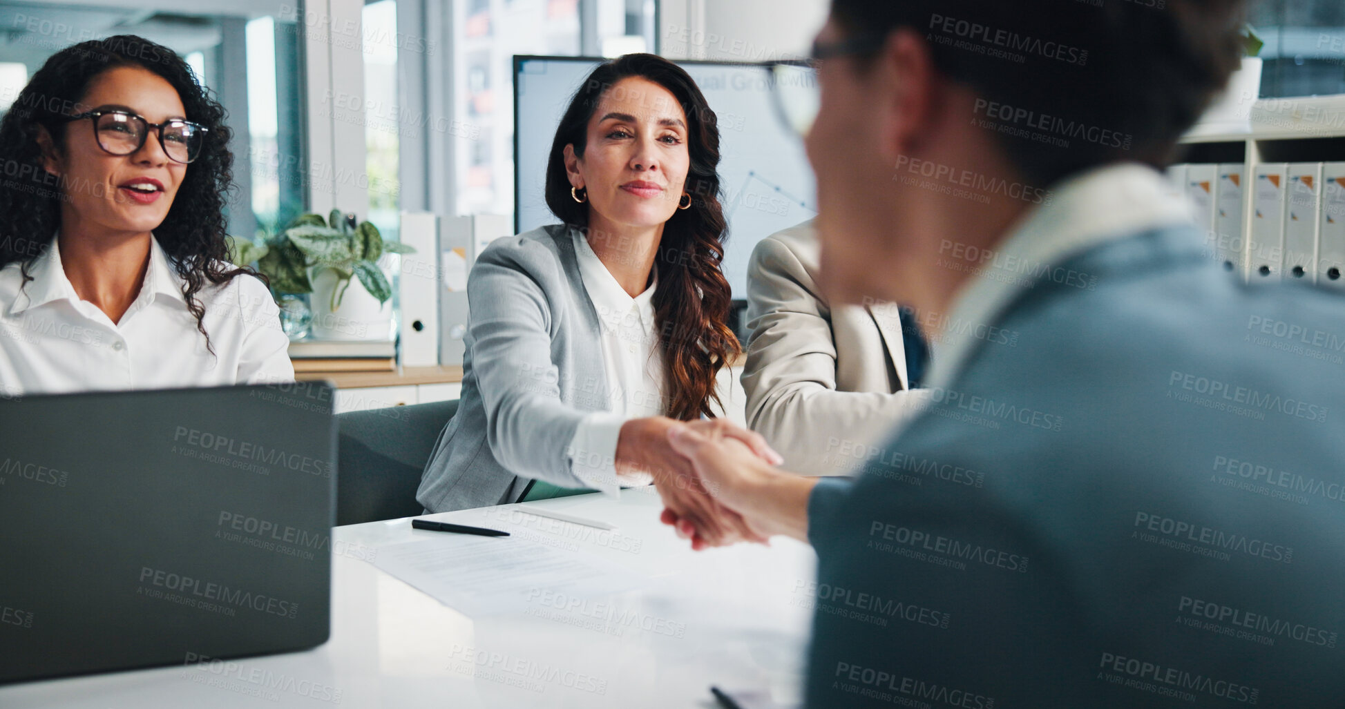 Buy stock photo Meeting, group and handshake with client, business and collaboration for financial performance or smile. Agreement, happy and people with laptop for investment, accountant and deal for colleagues