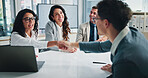 Happy, finance or business people shaking hands in meeting for planning, charts or capital growth. Handshake, accounting agreement or financial advisor with investor, graphs or executive directors
