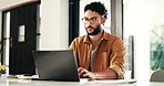 Laptop, typing and man in home for freelance, online research and journalist proofreading story. Computer, serious and remote worker writing creative article, editing and review news for publication