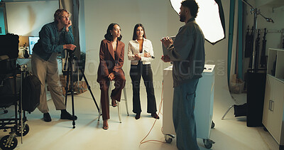 Buy stock photo Photographer, review and tablet with people in studio together for discussion, photoshoot or planning. Backstage, creative or media with makeup artist, model and photography on set for collaboration