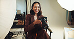 Happy, woman and photographer with portrait in backstage for photoshoot results, catalog and selection. Person, camera and career in photography, film production and editing picture in media industry