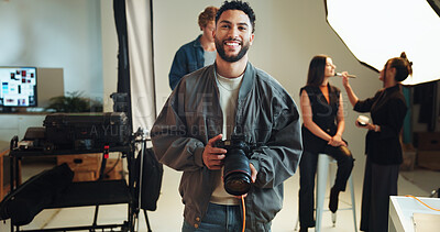 Camera, portrait and smile with photographer in studio for start of catalog or magazine photoshoot. Backstage, creative or media with makeup artist and model getting ready for photography on set