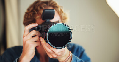 Buy stock photo Camera, lens and photographer man on set for behind the scenes photoshoot or production. Catalog, backstage or magazine with person in professional photography studio for artistic or creative process