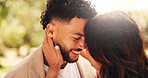 Forehead touch, smile and couple on date, outdoor and romance for people in nature, love and anniversary. Park, woman and affection for man, happy and together for valentines day, care or commitment