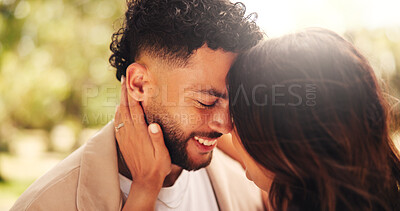 Buy stock photo Forehead touch, smile and couple on date, outdoor and romance for people in nature, love and anniversary. Park, woman and affection for man, happy and together for valentines day, care or commitment