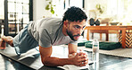 Fitness, man and plank in home for workout, training or thinking of balance. Core exercise, muscle or strong person on floor for body strength, health or wellness with endurance challenge for pilates