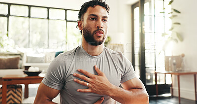 Buy stock photo Breathing, exercise and pilates with man in living room of home for health, wellness or yoga routine. Fitness, holistic and inner peace with person on floor of apartment for balance or mindfulness