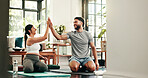 Active, couple and high five for yoga at home for exercise success, fitness break and wellness goals. Smile, people and agreement for workout, holistic achievement and celebration of bonding together
