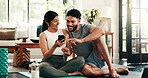 Couple, phone and bonding with fitness, living room and yoga mat for exercise, bonding and post on web blog. Woman, man and smartphone for memory, communication and social media on floor in home