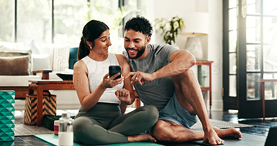 Buy stock photo Couple, phone and bonding with fitness, living room and yoga mat for exercise, support and post on web blog. Woman, man and smartphone for memory, communication and social media on floor in home