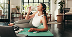 Drinking water, fitness and laptop  with woman in home for exercise, hydration or wellness workout. Bottle, relax and pilates with thirsty person in apartment living room for online training course