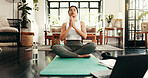 Fitness, laptop and meditation with woman in living room of home for health, pilates or wellness routine. Exercise, online course and yoga with Indian person on floor of apartment for mindful balance