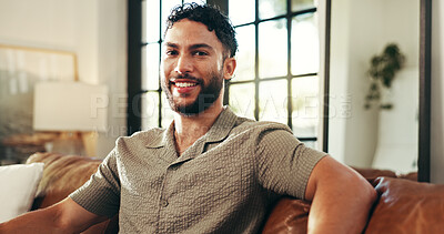 Buy stock photo Portrait, relax and happy man in home on sofa for peace, calm and break on staycation with confidence in house. Face, smile and person in living room for chilling, resting and comfort in apartment