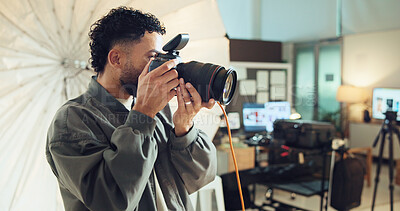 Buy stock photo Photographer, camera and man in studio, skills and backstage with tech, entrepreneur and project. Person, employee or guy with professional, business for pictures and media agency for magazine
