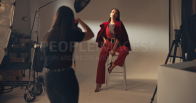 Buy stock photo Photoshoot, photographer and model on set, fashion and pictures for magazine in studio and production. Backstage, creative and tech for project in media agency, camera and equipment for photography