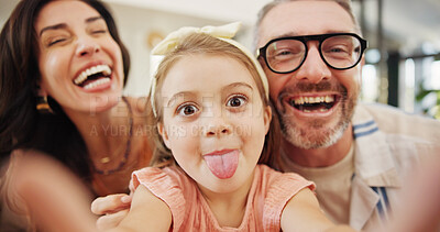Buy stock photo Selfie, laughing and family on sofa in home for memory, bonding or social media post together. Goofy, photography and parents with girl child for silly profile picture in living room at house.
