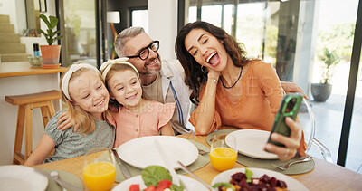 Buy stock photo Selfie, excited and family at table for lunch in home together with memory, bonding or connection. Photography, food and parents with girl children for profile picture, healthy meal and happiness
