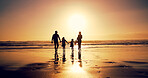 Sunset, family and holding hands at sea for vacation, walking and bonding together outdoor. Back, mother and father with children at beach with mockup space, travel or summer adventure with parents