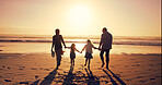 Sunset, family and holding hands at beach for vacation, holiday and bonding together outdoor. Back, mother and father with children at ocean with mockup space, travel or summer adventure with parents