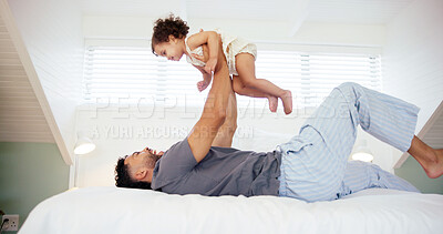 Buy stock photo Home, airplane and father with baby, playing and bonding together with relationship. Bedroom, parent and dad with kid, love and fun with smile, lifting game and fantasy with support, flying and care