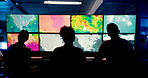 Weather, screen or monitor with people for forecast, satellite maps or teamwork to track storm. Control room, back or scientists with meteorology for broadcast news, report or climate change at night
