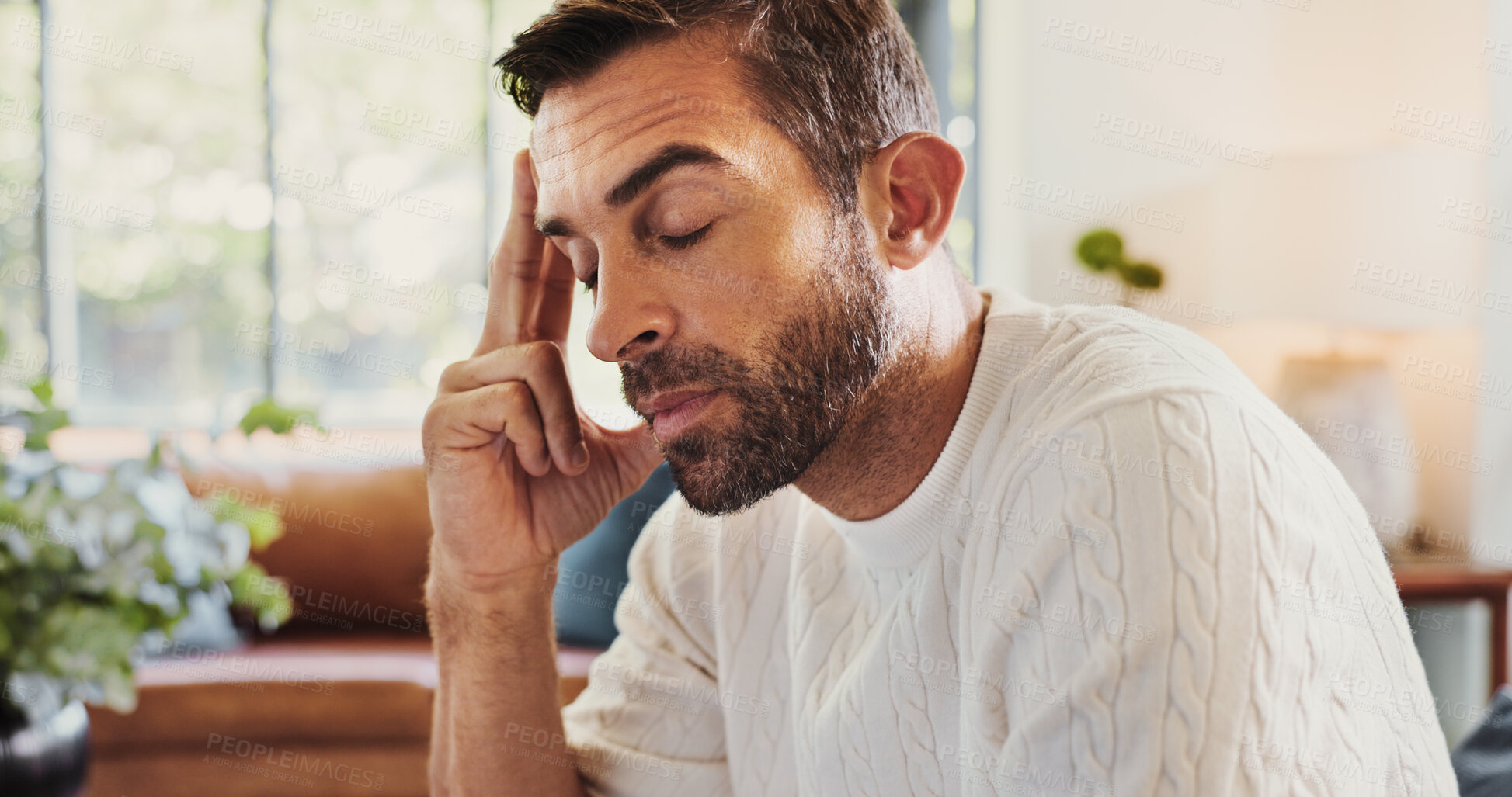 Buy stock photo Sick, headache and man in home with stress for challenge, bankruptcy and financial crisis. Migraine, pain and tired person in living room with fatigue, exhausted and frustrated with mental health